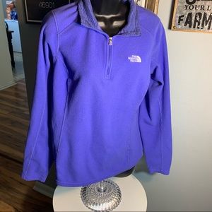The north face size large fleece pullover There is some wear on the elbow areas.